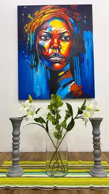 a painting of a woman in a vase with flowers at Elégance & Confort in Rabat