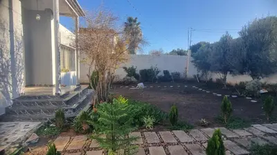 a garden in front of a house at ALTIS Immo Authentic House in Casablanca