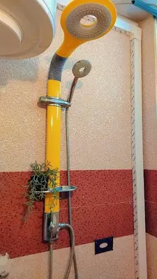 a water hose hooked up to a wall at Appartement au centre rabat dyour jamaa in Rabat