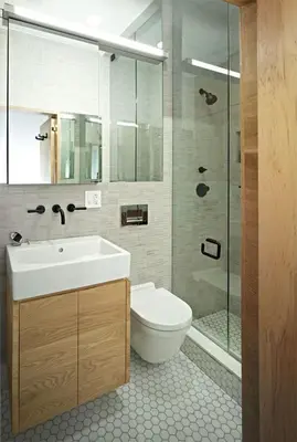 a bathroom with a toilet and a sink and a shower at Hotel OMAR BM in Casablanca