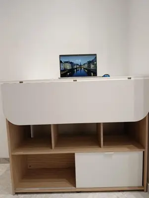 a white table with a tv on top of it at Naturalia Appart & Hotel - Casa Center in Casablanca