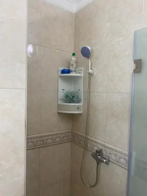 a shower in a bathroom with a shower head at Tradition & Modernité in Rabat