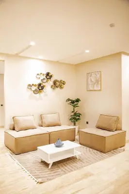 a living room with two couches and a table at Cozy Flat with Gym, fast WiFi and Great Location in Casablanca