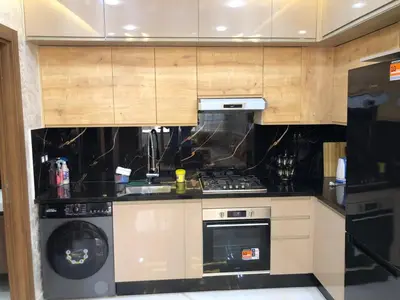 a kitchen with a stove and a dishwasher at Luxury Studio with Pool and Relaxing Atmosphere in O Ben Slimane