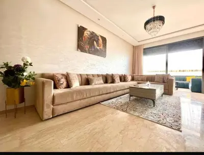 a living room with a couch and a table at Marco in Casablanca
