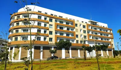 a large building with a lot of windows at Les terrace d'anfa in Casablanca