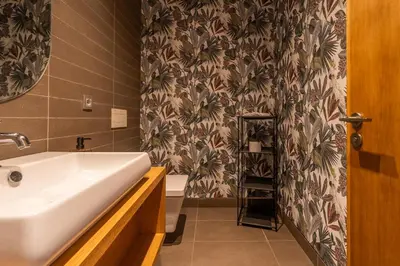 a bathroom with a sink and a toilet in it at Luxury Apartment Anfaplace style & elegant in Casablanca