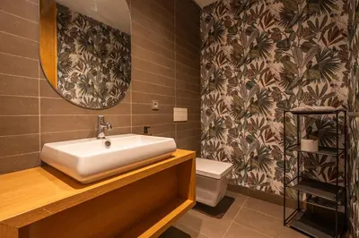 a bathroom with a sink and a toilet at Luxury Apartment Anfaplace style & elegant in Casablanca