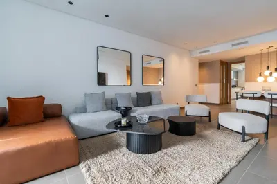 a living room with a couch and a table at Luxury Apartment Anfaplace style & elegant in Casablanca