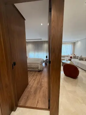 a room with a door leading to a living room at Cosy cocon central in Le Polo