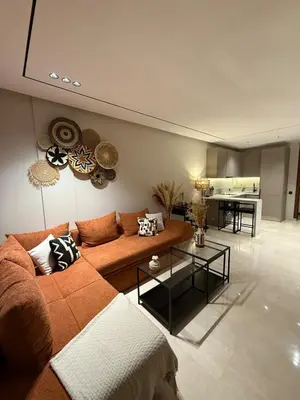 a living room with a couch and a table at Cozy and chic apartment in Casablanca in Casablanca