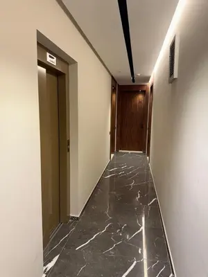 an empty hallway with a door and a marble floor at Cozy and chic apartment in Casablanca in Casablanca