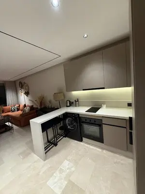 a kitchen with a stove and a dishwasher in a room at Cozy and chic apartment in Casablanca in Casablanca