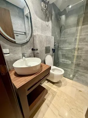 a bathroom with a sink and a toilet at Modern studio in Burgundy in Casablanca-Port