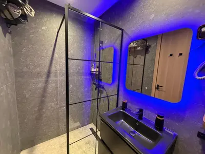 a bathroom with a sink and a mirror at CityZen in Casablanca