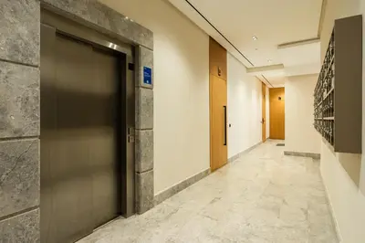 a hallway with a door in a building at CFC business, Coworking, gym, self check-in in Casablanca