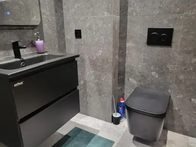 a bathroom with a sink and a toilet at O'Blu Pearl Casablanca Center, Morocco in Casablanca