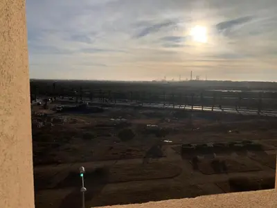 a view of a field with the sun in the sky at Park Plaza studio quiet comfort No one opposite in Mohammedia