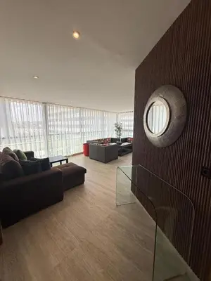 a living room with a couch and a window at Beautiful Ocean view Marina Casablanca in Casablanca