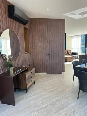 a living room with a desk and a mirror at Beautiful Ocean view Marina Casablanca in Casablanca