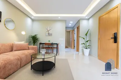 a living room with a couch and a table at Prestige APT Style & elegant RABAT by MERAT HOME in Rabat