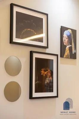 four frames on a wall with pictures on it at Prestige APT Style & elegant RABAT by MERAT HOME in Rabat