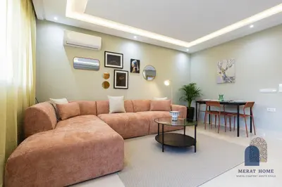 a living room with a couch and a table at Prestige APT Style & elegant RABAT by MERAT HOME in Rabat