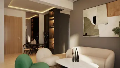 a living room with two chairs and a table at Appartement spacieux et calme - ain chock CASAblanca in Casablanca