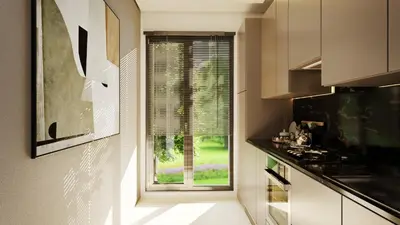 a kitchen with a window with a view at Appartement spacieux et calme - ain chock CASAblanca in Casablanca