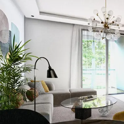 a living room with a couch and a table at Appartement spacieux et calme - ain chock CASAblanca in Casablanca