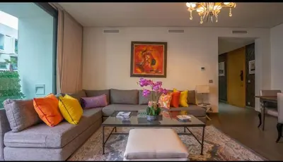 a living room with a couch and a table at Cosy home in Casablanca
