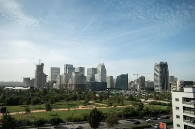 a view of a city skyline with tall buildings at CFC Modern Studio Emplacement Face à Anfa Park in Casablanca