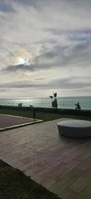 a park with a sculpture of a plane on the ocean at L' Evasion BLeu au Carroussel in Rabat