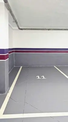 an empty room with two m signs on the floor at Appartement Cosy neuf - Salle de sport in Casablanca