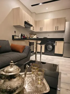 a living room with a couch and a table at apartment luxe dt7 in Casablanca