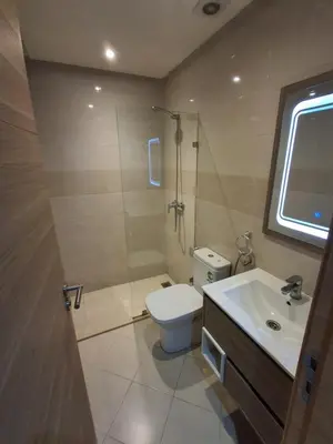 a bathroom with a toilet and a sink at Joli Studio Hôpital Cheikh Khalifa in Casablanca