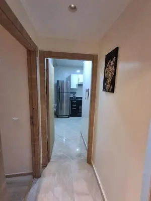 a hallway leading to a kitchen in a house at Joli Studio Hôpital Cheikh Khalifa in Casablanca