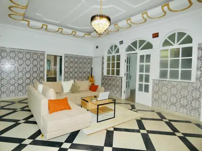 a living room with a couch and a table at Appartement meuble rabat in Rabat