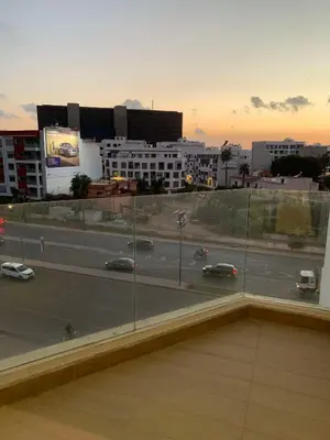 a view of a city with a highway and buildings at Bright & cozy studio in Oasis, close to train station in Casablanca
