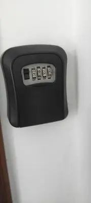 a close up of a remote control on a refrigerator at New 8th floor Terrace 5 min from train stations in Casablanca