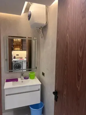 a bathroom with a sink and a mirror at Proche chekh khalifa KLIVING Studio in Casablanca