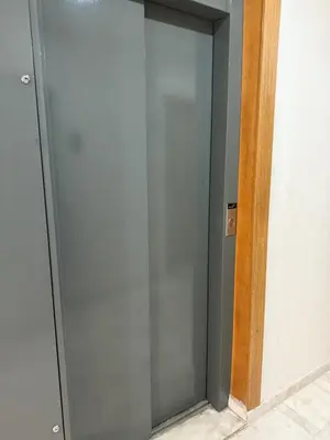 a sliding glass door in a room at Studio Stadium morocco for family in Mohammedia