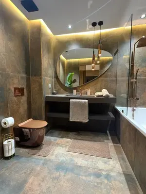 a bathroom with a sink and a mirror at Appartement haut standing Casablanca in Casablanca