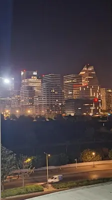 a view of a city at night with lights at Séjour élégant avec terrasse et vue sur la ville in Casablanca
