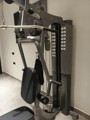 a gym with a bench and a machine at Séjour élégant avec terrasse et vue sur la ville in Casablanca