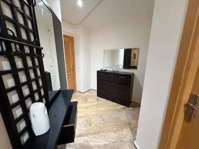 a room with a kitchen with a sink and a counter at Appartement spacieux Océan Rabat in Rabat