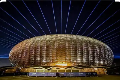 a large building with a large ceiling at night at Elégance &Confort Agdal in Rabat