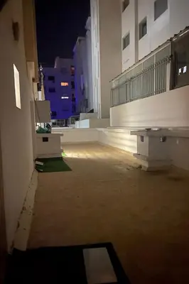 a view of an empty building at night at Casa Bourgogne 2-Bedroom apart, Guarded community in Casablanca