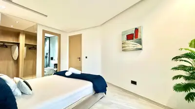 a bedroom with a large bed in a room at Luxurious studio with unobstructed view in Casablanca