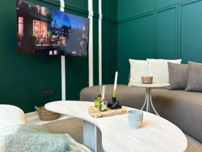 a living room with a couch and a table at Carrington Stay 13 in Casablanca